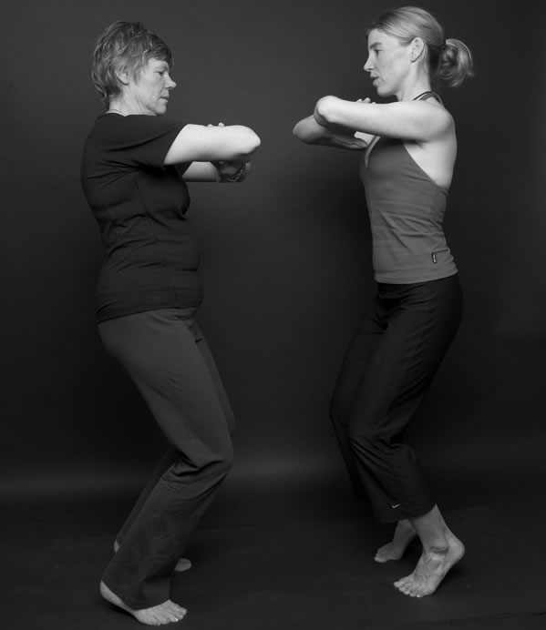 Robyn Baxter coaching a student in Pilates